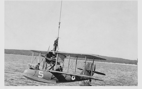 Supermarine Seagull III RAAF A9-5 being hoisted aboard HMAS Canberra in Sydney Harbour Circa 1935
