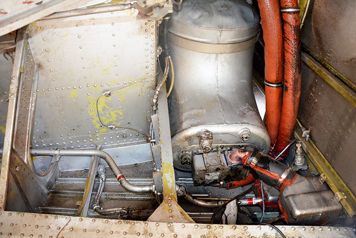 DHC-4 Caribou-A4-228 oil tank removal - a fun job as it still had a little oil left