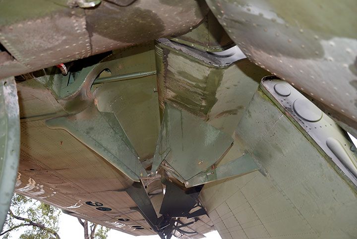 DHC-4 Caribou A4-228 wing dismantling proceeding well