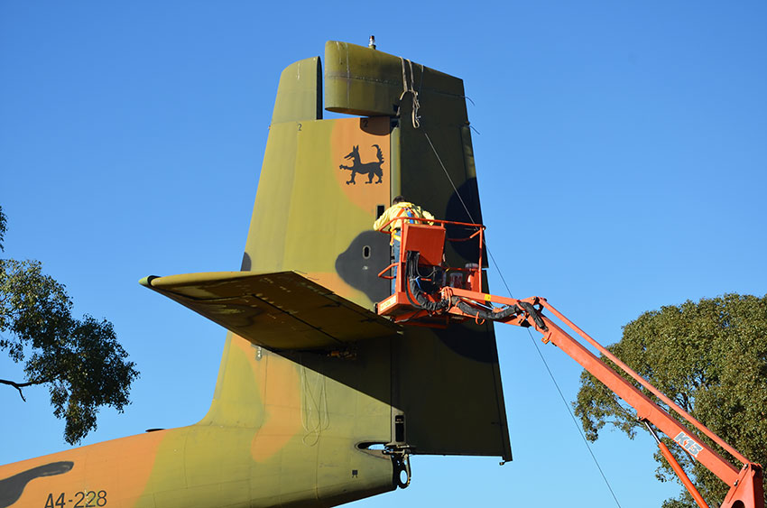 Noel Spalding prepares the rudder of A4-228 for a crane lift-off