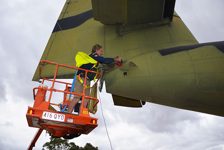 Noel Spalding working on Caribou A4-228 tail