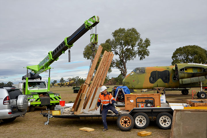 Preparing wing jigs for loading the wings for transportation