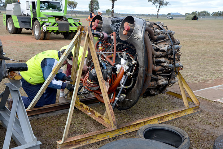 Putting the Caribou engine in the stand for transportation