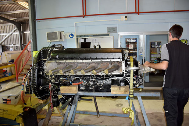 Cac mustang a68-769 - dave checks the rolls royce packard merlin v12 engine    | warbirds online