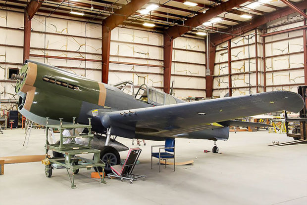 Side view Kittyhawk P40E tail number 41-25163 final assembly at Pima Air and Space Museum Oct 2017