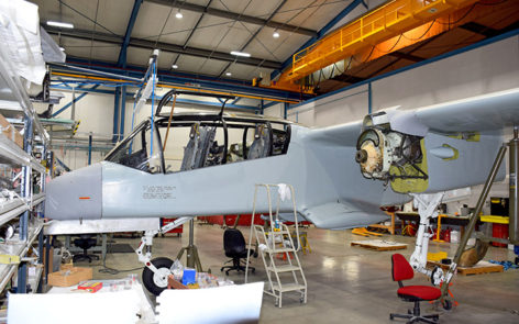 North American Rockwell OV-10A Bronco 67-14639 restored fuselage, engines and wing during restoration in July 2019